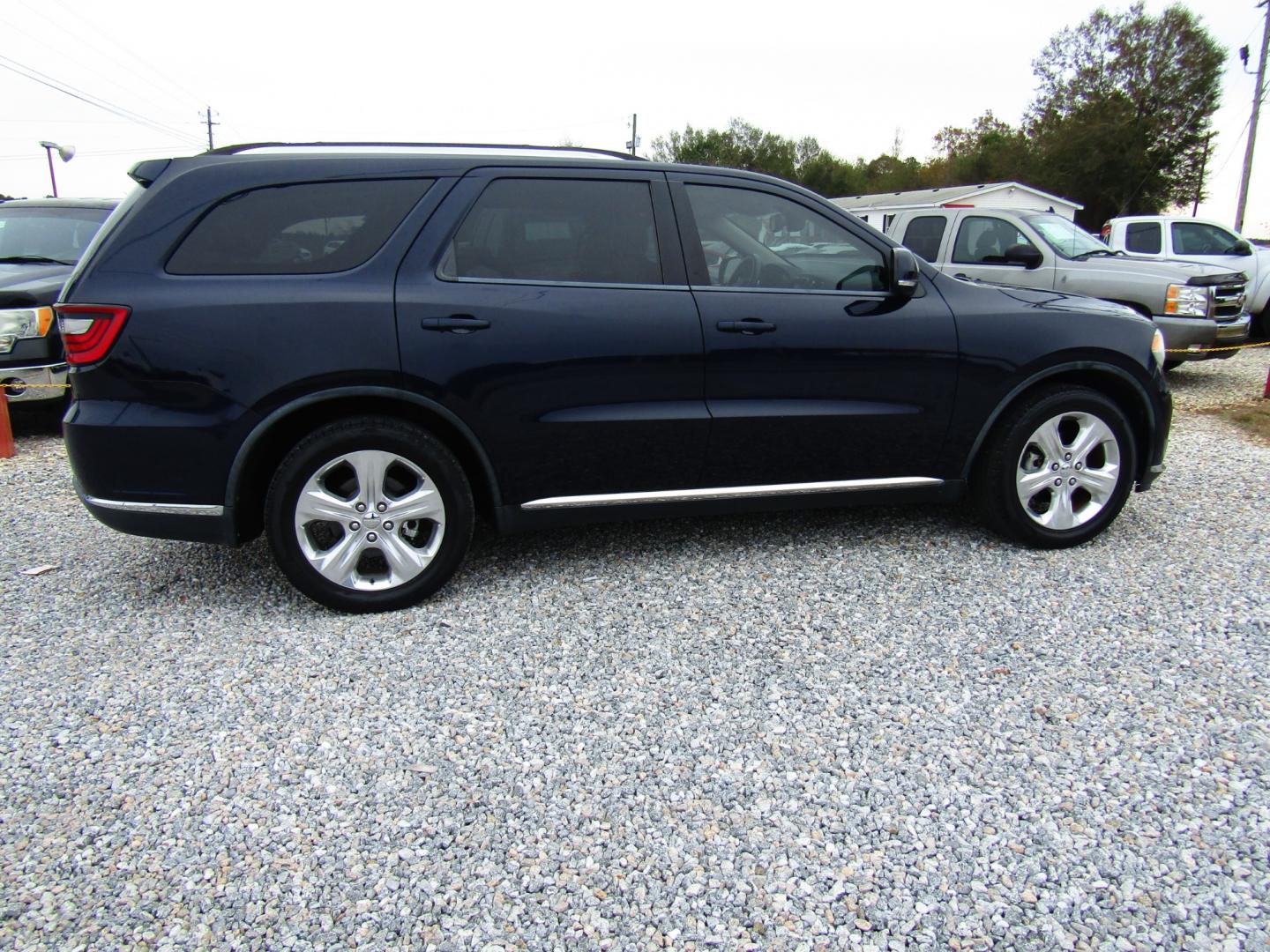 2014 Blue /Tan Dodge Durango (1C4RDHDG5EC) , Automatic transmission, located at 15016 S Hwy 231, Midland City, AL, 36350, (334) 983-3001, 31.306210, -85.495277 - Photo#7